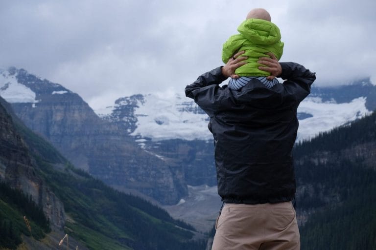 family looking at the rockies