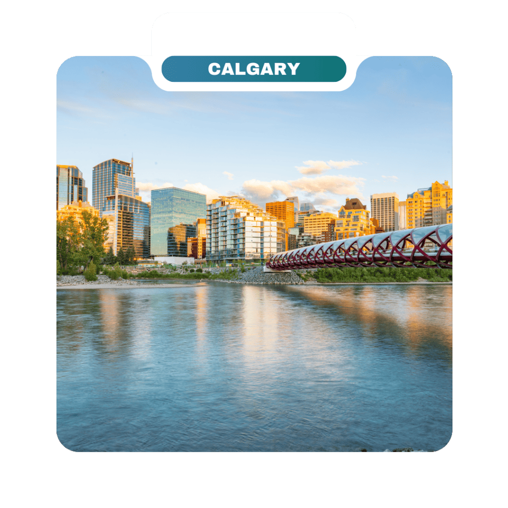 Downtown Calgary skyline with modern buildings reflected in the river, a favorite destination for homeowners, featuring the red Peace Bridge on the right under a partly cloudy sky.