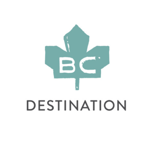 A teal maple leaf with the letters "BC" inside is above the word "DESTINATION" in capital letters, representing vacation rental management in Harrison Hot Springs, all set on a white background.
